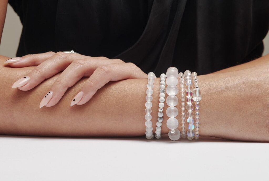 Clear quartz crystal bracelet with transparent beads, symbolizing energy amplification, mental clarity, and spiritual healing. Ideal for meditation, chakra alignment, and intention setting.