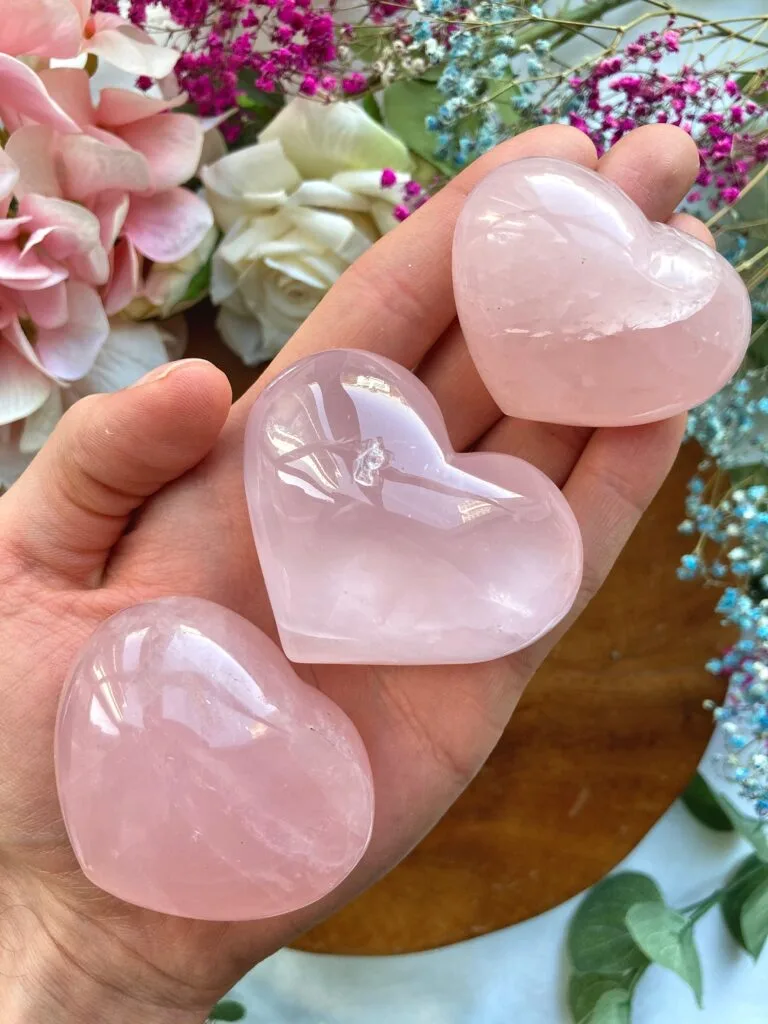 Raw rose quartz crystal with soft pink hues, symbolizing love, emotional healing, and heart chakra energy. Ideal for spiritual rituals, meditation, and holistic wellness.